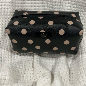 Brown and tan Kate spade make up bag